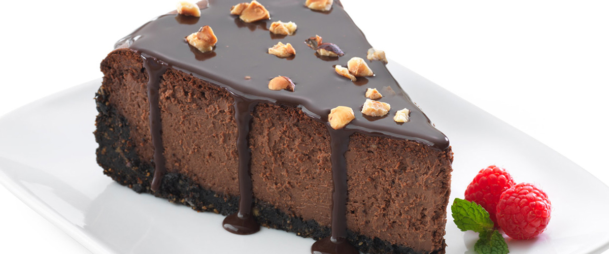 Dark Chocolate Cheesecake with Chocolate Hazelnut Ganache, Toasted Hazelnuts, & Sea Salt 