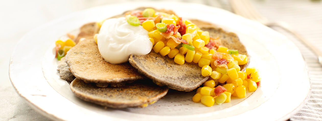 Blue Corn Cakes with Fresh Corn, Bacon and FAGE Total