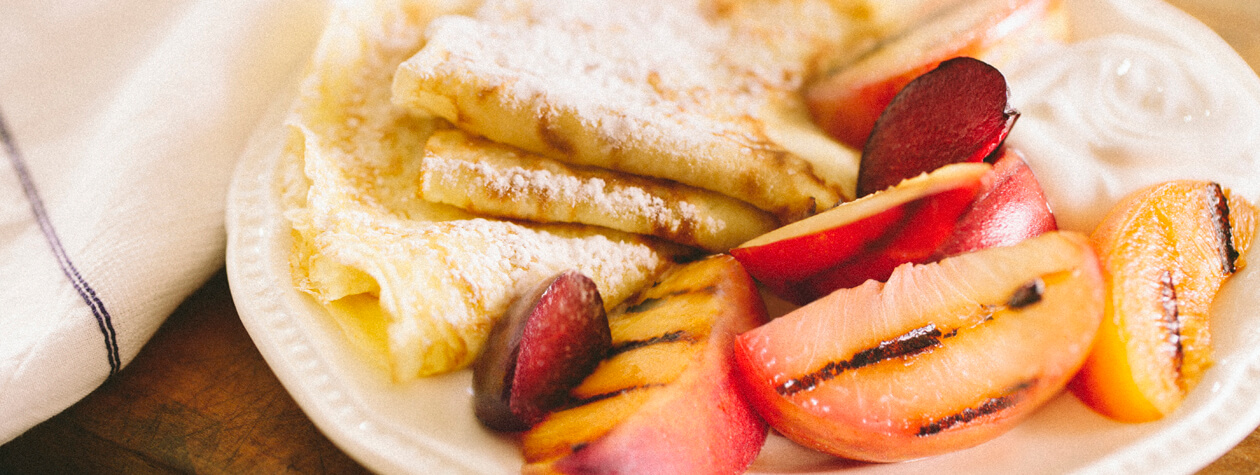 Crepes with Grilled Peaches and Plums and FAGE Total