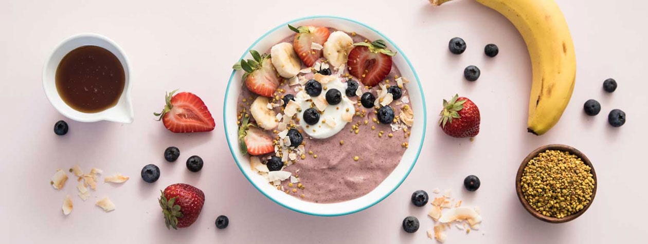 Yogurt Smoothie Bowl with Honey, Fruit, and Coconut